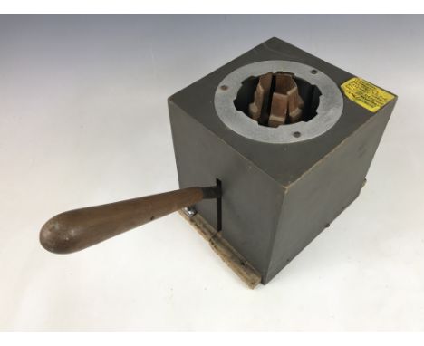 A Second World War British civilian gas mask fitting / assembly tool