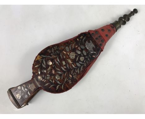 A 19th Century pair of tortoiseshell and mother of pearl fire bellows, having marquetry inlaid urns of roses peppered with so