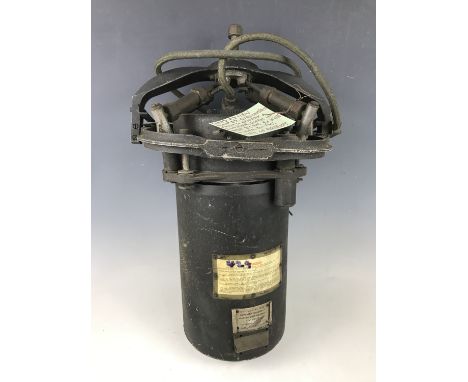 An RAF aircraft master gyro compass, bearing a note stating it was taken from a Halifax bomber