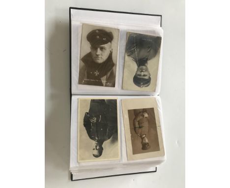 A collection of early 20th Century postcards on the subject of military aviation including photographic portrait cards, studi