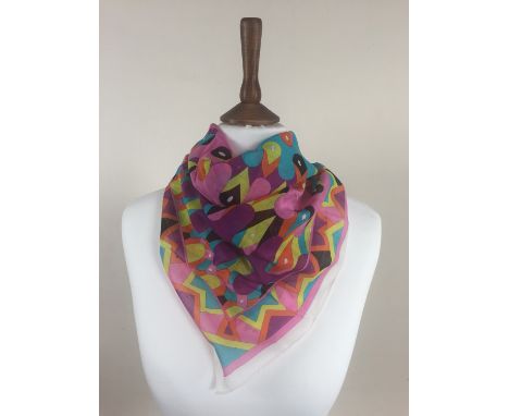 Two vintage Emilio Pucci head square / neck scarves, with original paper labels, silk and cotton blend, printed in tones of p