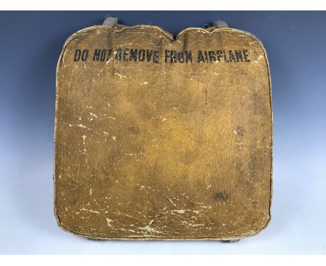 A Second World War US Army Air Force aircraft cushion / float, bearing a label which reads "American Flying Fortress bomber c