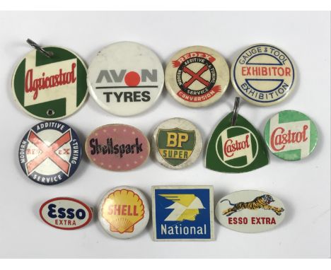 A number of vintage car and automotive related button and lapel badges, fobs etc