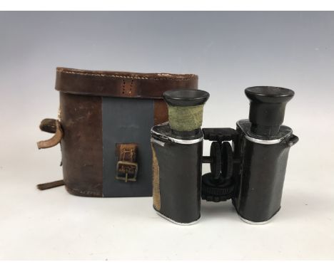 A cased set of Great War Trieder Binocle binoculars by Goertz of Berlin, engraved R C Reeves Royal Field Artillery