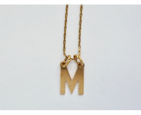 A 9ct gold initial 'M' pendant on a fine box-link neck chain, 3g