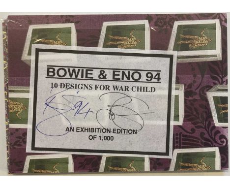 A rare limited edition set of 10 postcards, with laminated slip signed by David Bowie and Brian Eno. Excellent condition. Pro