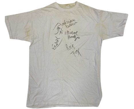 A plain white t-shirt (no size label though looks XXL) signed in marker pen by David Bowie (dated 1990) and Sound + Vision to