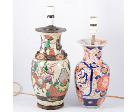 Table lamp, modelled with a Chinese vase, Famille Verte; an Imari vase; and a raspberry glass lampshade.