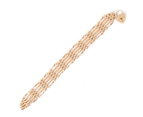 A 9 carat yellow gold modern five gate link bracelet, 15mm wide, three plain bars to centre with crimped bar to each side, fi
