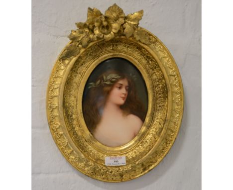 Berlin porcelain plaque, head and shoulders portrait of a young lady, with a laurel wreath, oval, 16cm c 12cm (a.f.), repaint