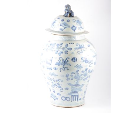 Large Chinese blue and white jar, the ovoid body painted in underglaze blue, with vases of flowers and objects, the cover wit