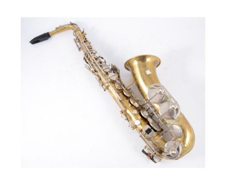 A vintage Embassy trumpet, cased and a clarinet and saxophone. (3)