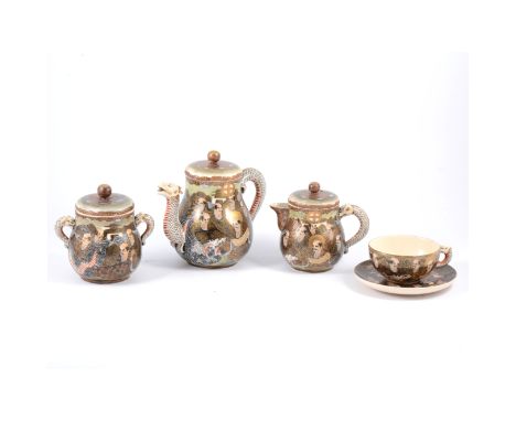 Japanese Satsuma teaset comprising teapot, 15cm, sugar bowl, milk jug, six cups and saucers.