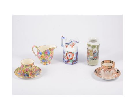 Royal Winton chintz teaware in the "Sweet Pea" design, six cups, five saucers, milk and sugar, Royal Winton "Quilt" milk and 