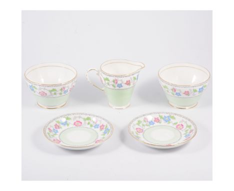 A Royal Grafton tea service, spring flowers on a white ground with wide pea green border pattern number 6744, comprising sixt