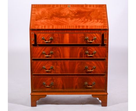Reproduction George III style mahogany bureau, fall front enclosing an interior fitted with a writing surface, drawers and pi