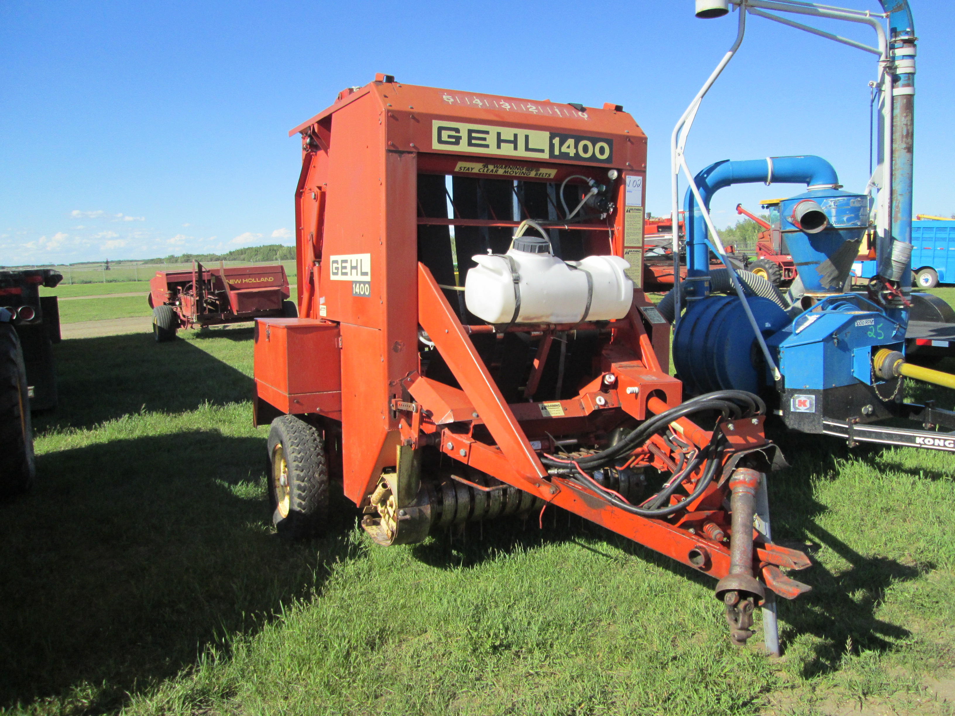 GEHL 1400 ROUND BALER, LOT 102