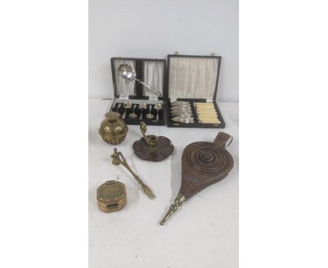 A mixed lot to include an Art nouveau chamber stick candle holder, brassware to include a candle snuffer and others together 