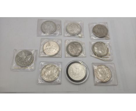 A group of American silver coinage comprising 8 Morgan dollars, 1884, 1921, 1883 and others together with two silver Peace do