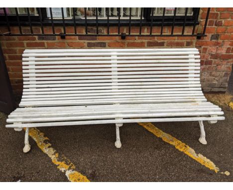 A Victorian white painted bench with cast iron feet 184cm long x 80cm deep x 79cm high Location:If there is no condition repo