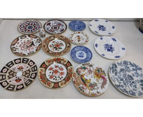 Eight Royal Crown Derby plates to include seconds, a Royal Crown Derby silver stopper squirrel paperweight, Worcester and oth
