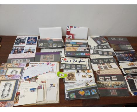 A collection of Royal Mail first edition covers stamp set to include Princess Diana, Enid Blyton, a CPL cat of the year set, 