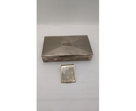 Silver smoking related items to include a cigarette box with engine turned lid A/F together with an Ellis and co matchbook ho