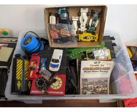 A large quantity of Scalextric model motor racing track, cab, accessories, controllers, magazines and other itemsLocation: RA