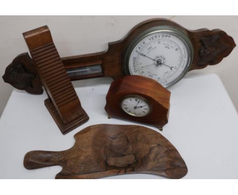 Aneroid barometer and thermometer with silver dials and carved oak case, Edwardian inlaid mahogany mantel timepiece, an oak s