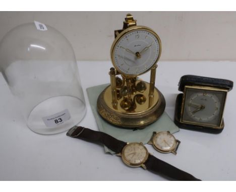 Small Bentima Anniversary Clock under glass dome with instructions, guarantee and key, a gold plated Timex self-wind wristwat