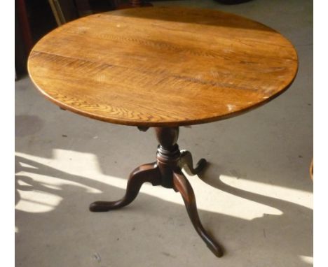 Late 19th C oak tripod table, circular top on baluster column and three splay legs (diameter 89cm, height 74cm) 