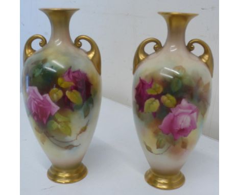 Pair of Royal Worcester vases, ovoid bodies painted with roses, gilt handles and base, shape 284, (H17cm) 