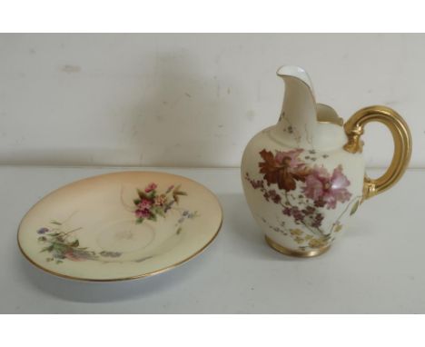 Royal Worcester jug, shape 1094 RD No.29115, blush body painted with flowers, scroll handle, and a similar  circular saucer p