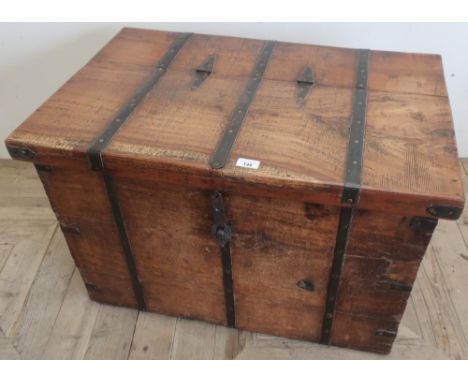 Indian metal bound hard wood trunk, with hinged lid and strap catch (80cm x 51cm x 52cm) 
