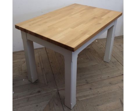 Oak topped kitchen table, with solid block oak top, on cream painted supports inscribed "Made by Graham Haw for Velma Scales 