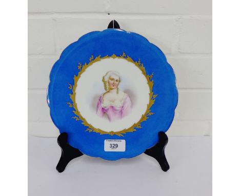 A Sevres porcelain cabinet plate with Celeste bleu border and Marquise portrait to centre, (rim with restoration) 23cm diamet