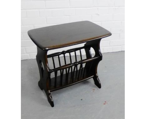 An Ercol dark elm magazine rack, 52 x 55cm 
