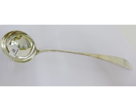 A 19th century Scottish Provincial silver Celtic point soup ladle with engraved initial to terminal, 38cm long 