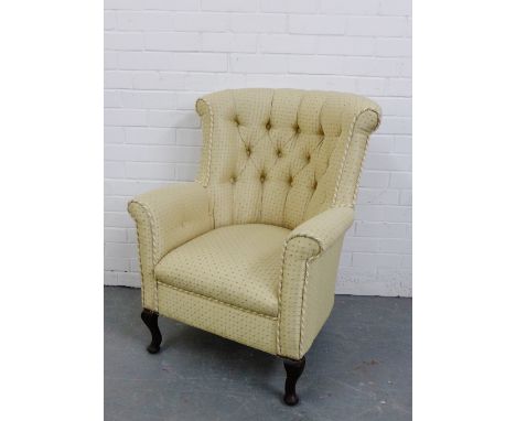 A button back upholstered armchair on cabriole supports, 94 x 75cm 
