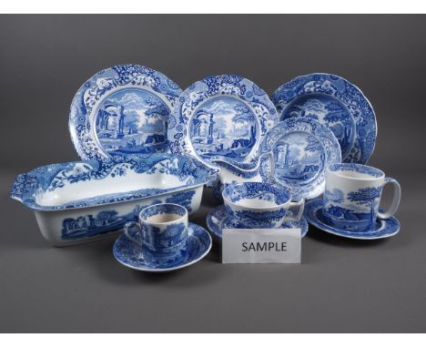 A quantity of Spode blue and white "Italian" pattern table china, including mugs, teacups, plates, an oven dish and other ite