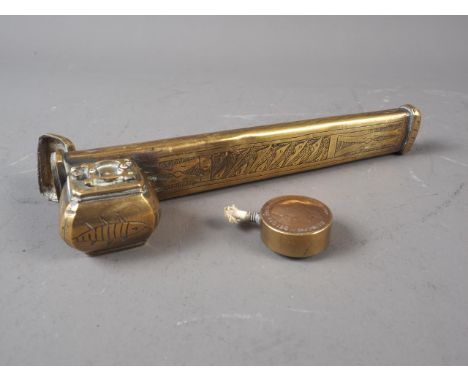 A Persian engraved brass pen box/case, 8" long, and a penny (1d) copper lighter