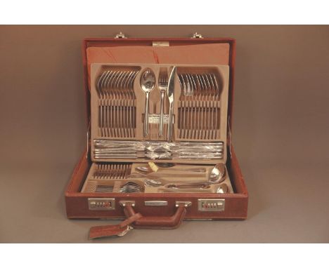 A complete Waltmann Und Sohn stainless steel cutlery set for twelve, in fitted canteen, and a K Kimmel Solingen stainless ste