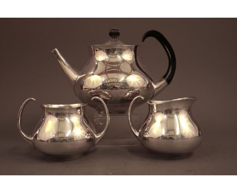 A Mappin &amp; Webb silver plated three-piece teaset, designed by Eric Clements, comprising teapot with shaped ebonised handl