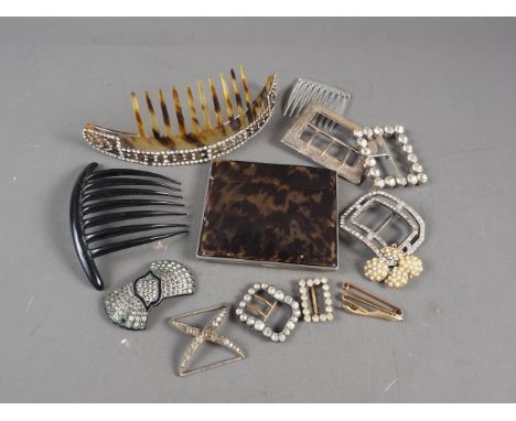 A 9ct gold bar brooch, 2.2g, a silver buckle, 1.3oz troy, a tortoise paste set comb, and a number of paste set buckles, etc