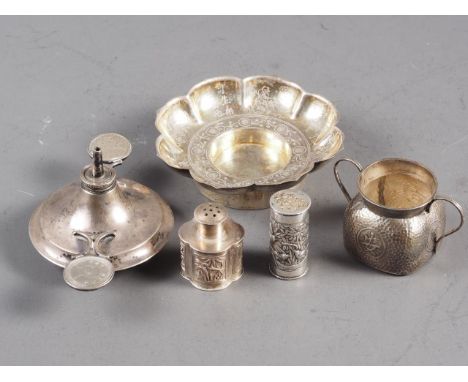 A Hukin &amp; Heath silver cigar lighter, mounted two Chinese silver coins, two Chinese silver pepper shakers, a Chinese silv