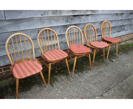 A set of five Ercol Windsor stick back dining chairs 