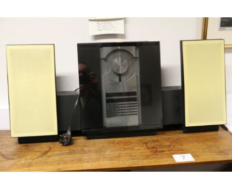 A Bang &amp; Olufson Beosound 3000 Series compact disc and digital audio sound system with speakers, 32 1/4" wide overall