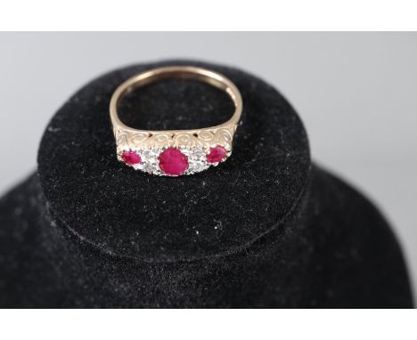 A Victorian style 9ct gold diamond and ruby dress ring, size O/P, 2.4g