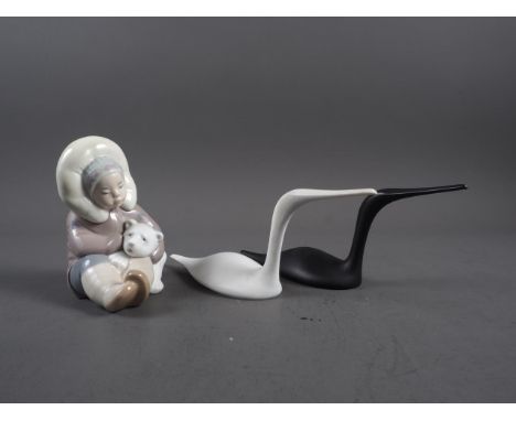Tapio Wirkkala for Rosenthal: a pair of birds, 3 3/4" high, and a Lladro Inuit child with polar bear cub, 5" high