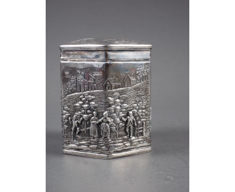A silver hexagonal-shaped tea caddy with hinged lid and embossed figures and two scene decoration, 3 1/2" high, 6.3oz troy ap